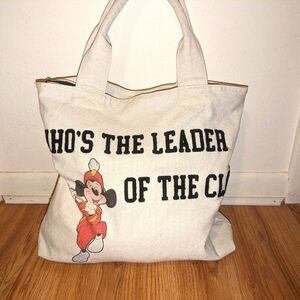 Mickey Mouse official Disney store tote bag with zippered closure.